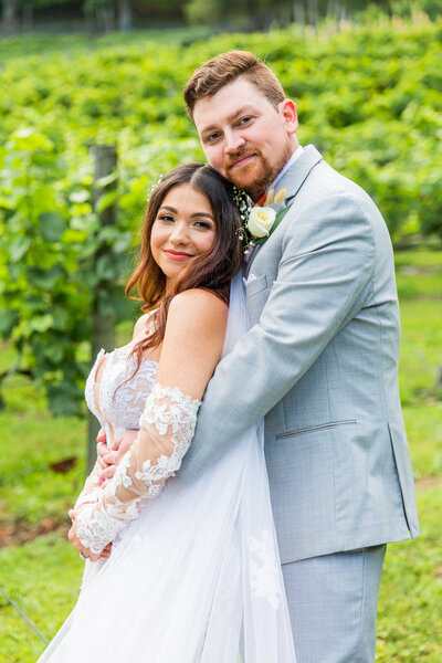 bride and groom about to kiss