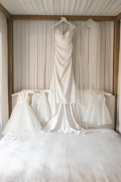 bride-in-a-peach-wedding-gown-sitting-in-a-chair