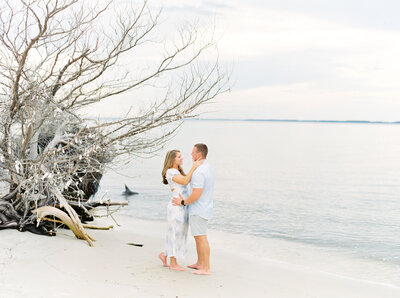A couple on the beach in Hilton Head enjoying their engagement