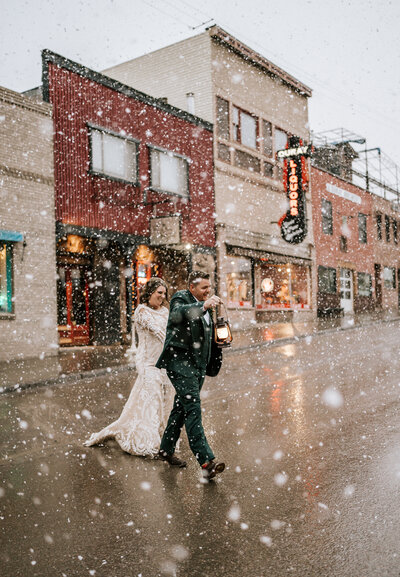 Bride and groom in downtown Ouray, colorado elopement photography
