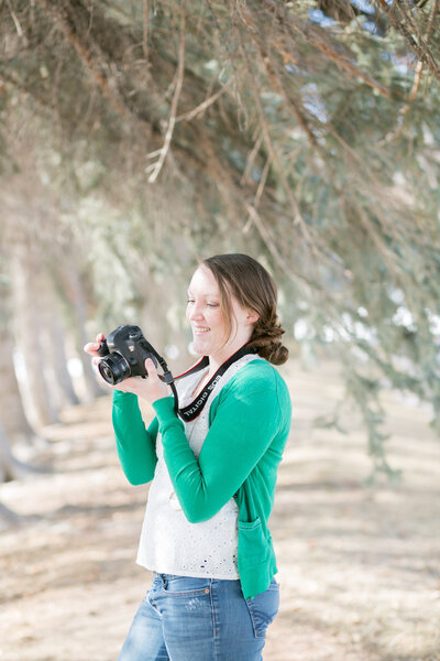 Seattle Wedding Photographer captures woman holding camera taking photos