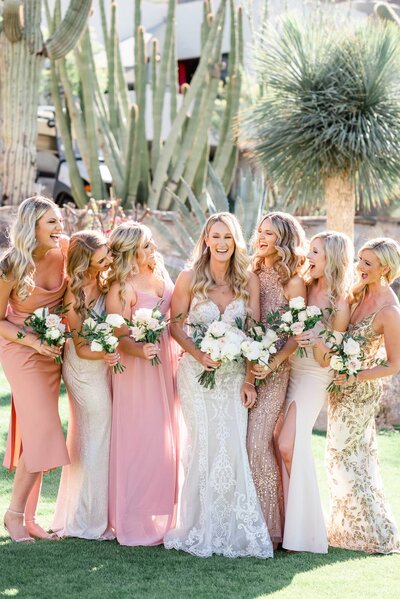 Wedding at the Sanctuary Scottsdale Bride and Bridesmaids laughing