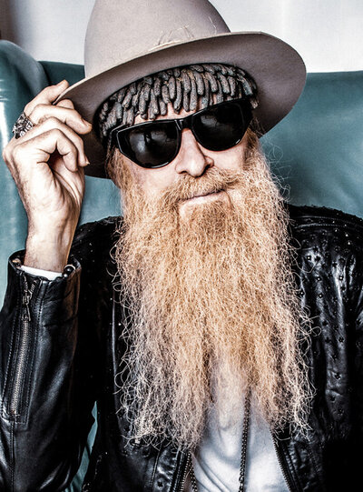 Billy F Gibbons musician portrait close up wearing hat and sunglasses