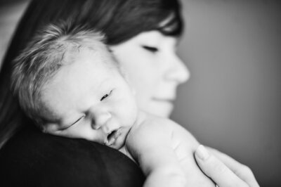 Tulsa newborn photographers lifestyle in home newborn session with baby girl 
