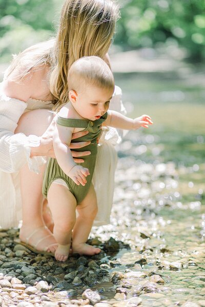 Indianapolis family photographer, Katelyn Ng Photographed a young boy and mother at a creek in Indianapolis, Indiana