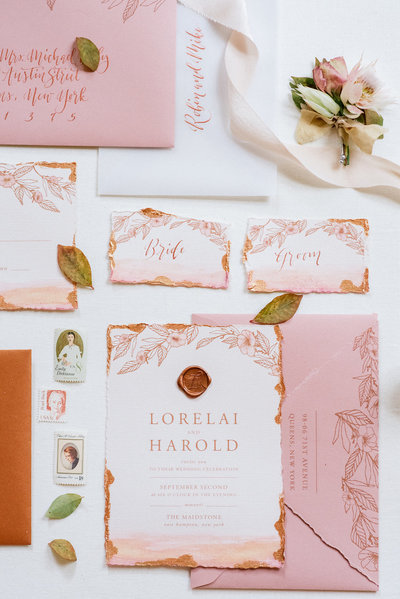 Dusty rose and copper invitation with deckled edges