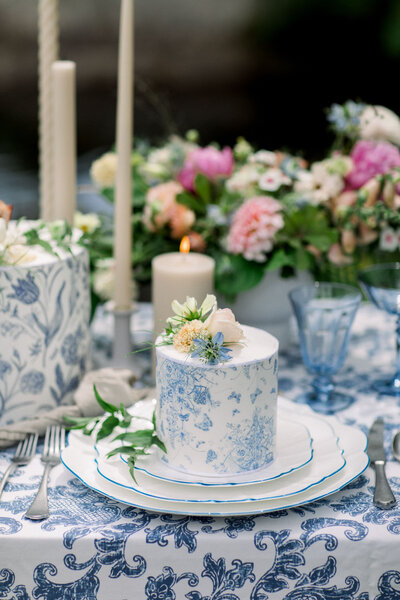 Floral wedding cake with blue and white details