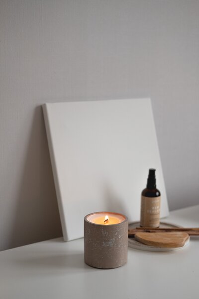 Neutral image of candle and non-toxic home accessories