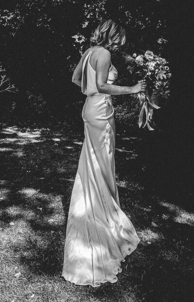 Bride from behind black and white photo