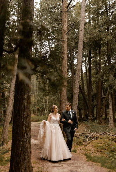 Adventure Elopement Couple  hiking in the woods