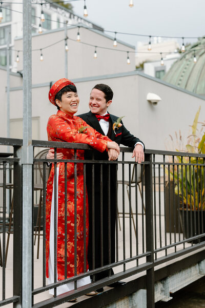 Multicultural couple's wedding portraits on a rooftop in San Francisco
