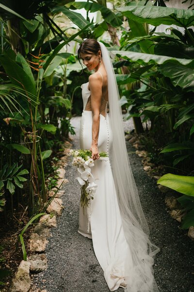 Bride in Tulum jungle at her tulum elopement.