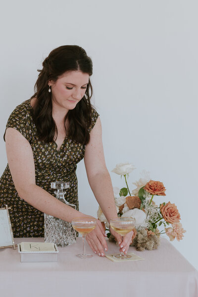 event-planner-serving-champagne-for-brand-photos-the-frame-charlotte