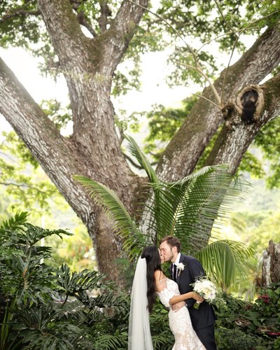 Bride and groom, kissing photography by Amy Jean