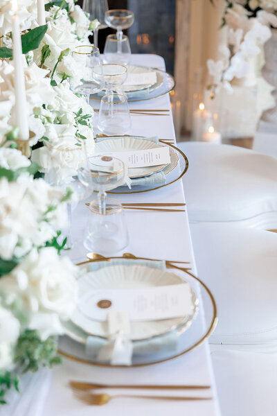 Wedding  guest dinner table  with white roses
