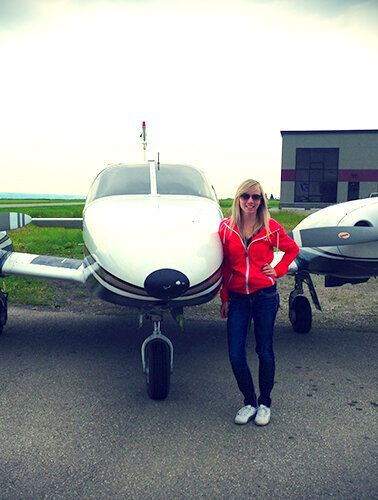 Marley Langford flying a plane during time off at Elua Digital Marketing