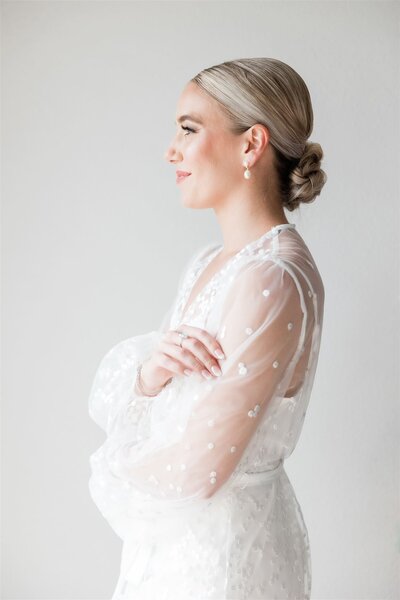 Bride in bridal robe editorial profile photo by Angelika Krug Photo & Film
