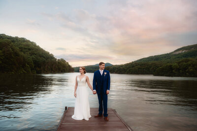 Newlyweds pose for portraits on their Micro Wedding Day in Lake Lure, NC.