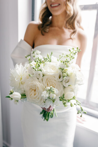Close-up of bridal bouquet with wedding rings nestled inside cincinnati