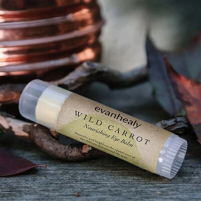 Primally Pure Dry Shampoo container with powder spread around it