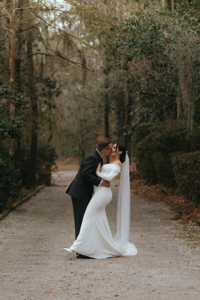 Couple kissing on their wedding day