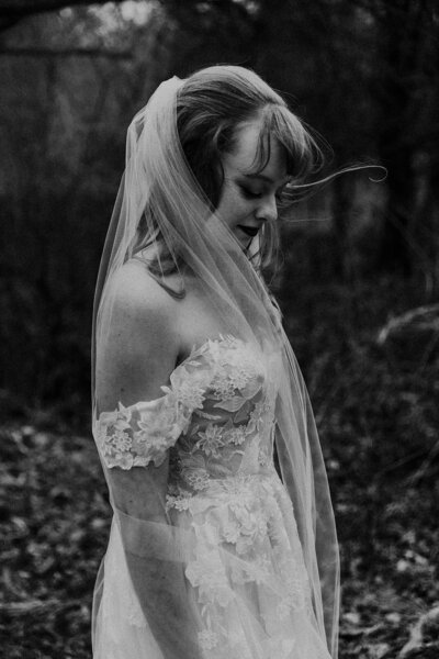 bride standing in windy day feels like Jane Austen novel