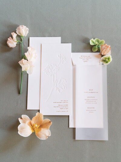 Embossed stationery and invitation suite