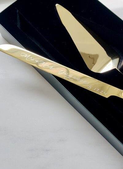 Personalized gold wedding cake knife with g=hand engraved name