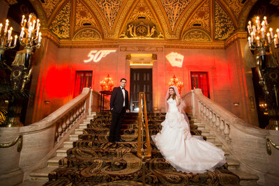 An indoor bride and groom portrait on a gorgeous  stairs.
