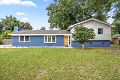 214 W Bedford Rd., Wilminton NC, a 
Modern Split-Level Home with Blue Brick Exterior 