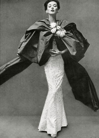 Richard Avedon black and white photo of a 1951 Balenciaga evening gown and cape.