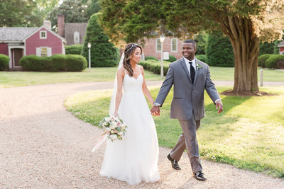 bride and groom walking in savannah GA