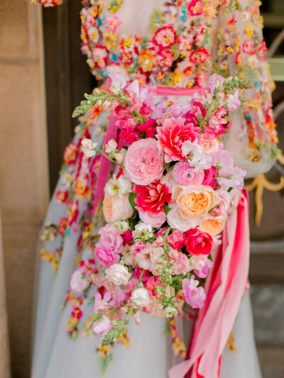 colorful floral dress and wedding bouquet