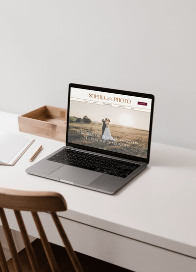Laptop showing a classy, elegant wedding photography website design