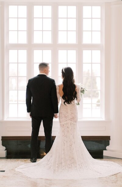 bride and groom wedding window