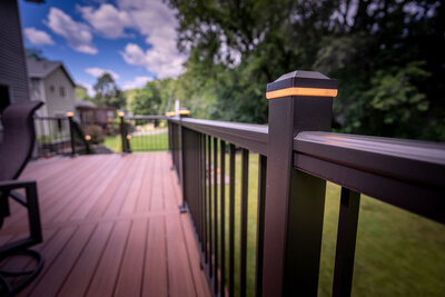 Post cap lights on TimberTech Impressions aluminum railing. 