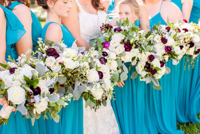 Stunning bride holds her bouquet