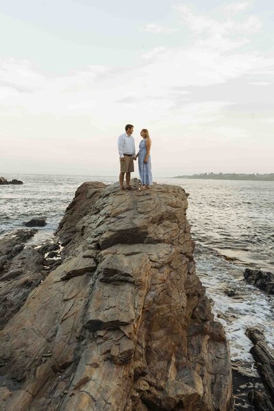 Couple Posing On Coastal Rock