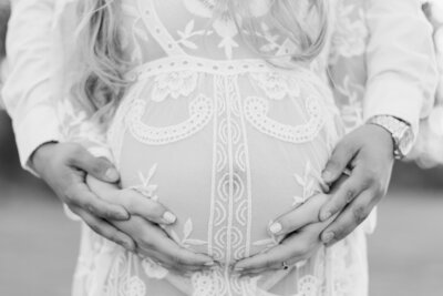 Monterey pregnant belly close up in lace dress