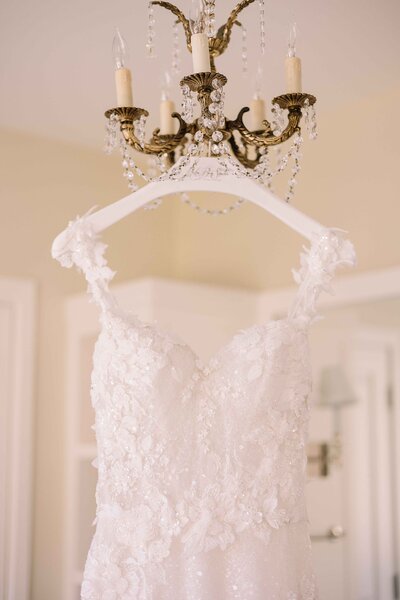 Wedding Dress Hanging from Chandelier - Mikayla & Mario | Harmony Meadows Wedding - Lake Chelan Wedding