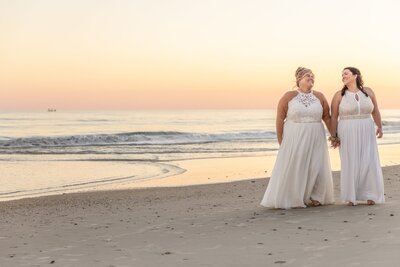 Two brides on beach