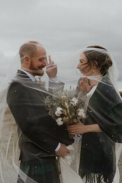 Bride and Groom in Veil