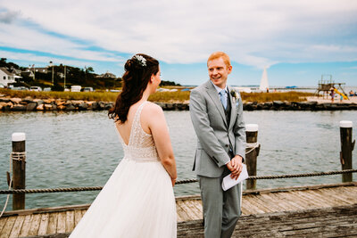bride and groom first look at harwich port massachusetts