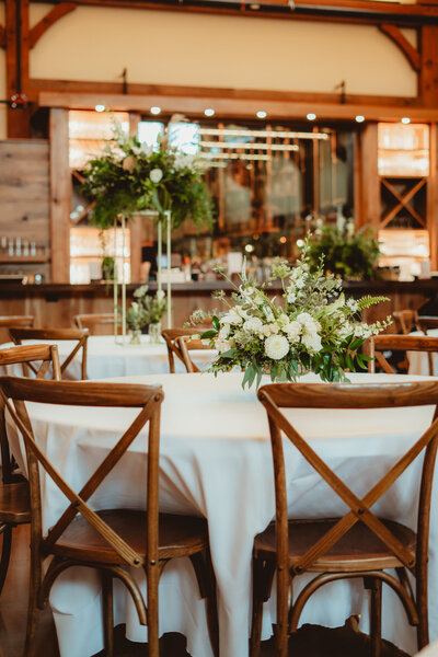 a table settings in the barn at barnwood events, a wedding venue in madison, winconsin.