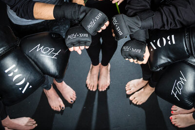 women with kickboxing gloves