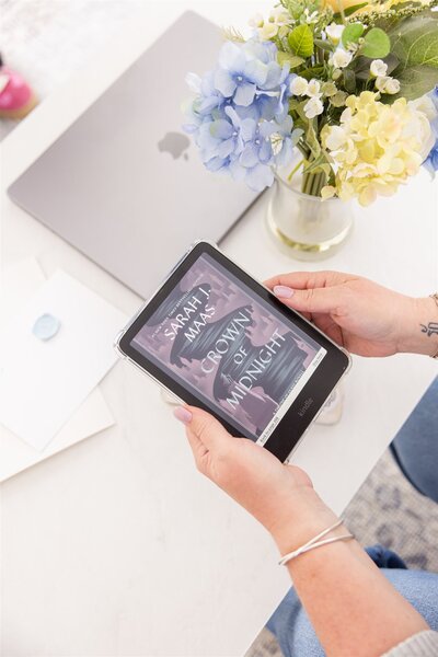 Tiffany holding one of her kindle's in her Boise photography studio.
