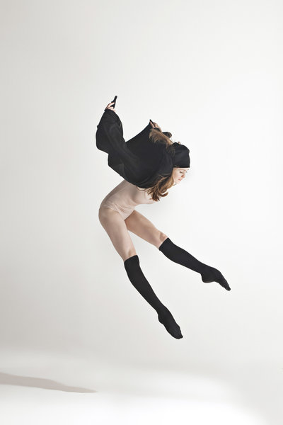 young-beautiful-dancer-in-beige-swimsuit-dancing-P473NRM