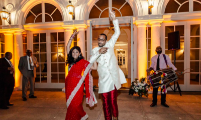 Indian Wedding Couple Celebrating as exiting Boston Mansion