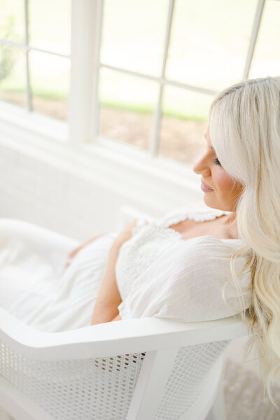 In Home Photos of a Pregnant Mom in a White Dress
