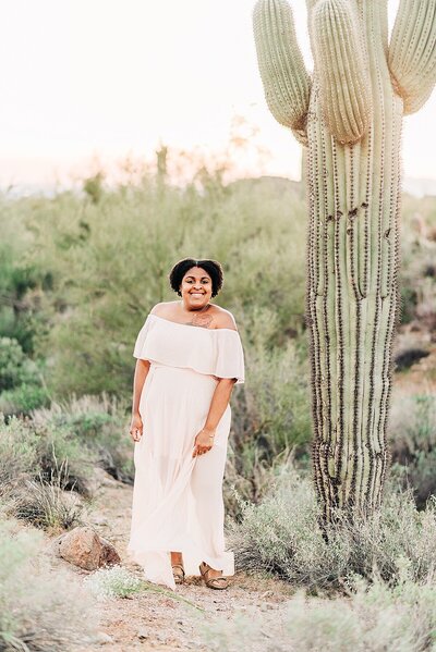 Jasmyn Coleman, Phoenix photographerstanding next to saguaro cactus